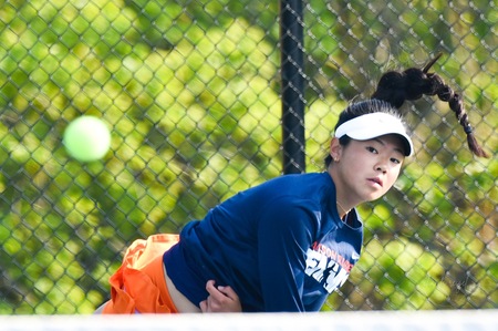 Gu Advances in Tennis Tournament